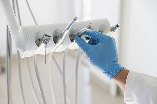 Professional Root Canal Treatment technician working in L'Anse, MI